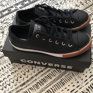 Black leather converse.